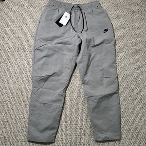 Nike Sportswear Tech Woven Lined Commuter Pants Cobblestone Mens Large $100 NWT